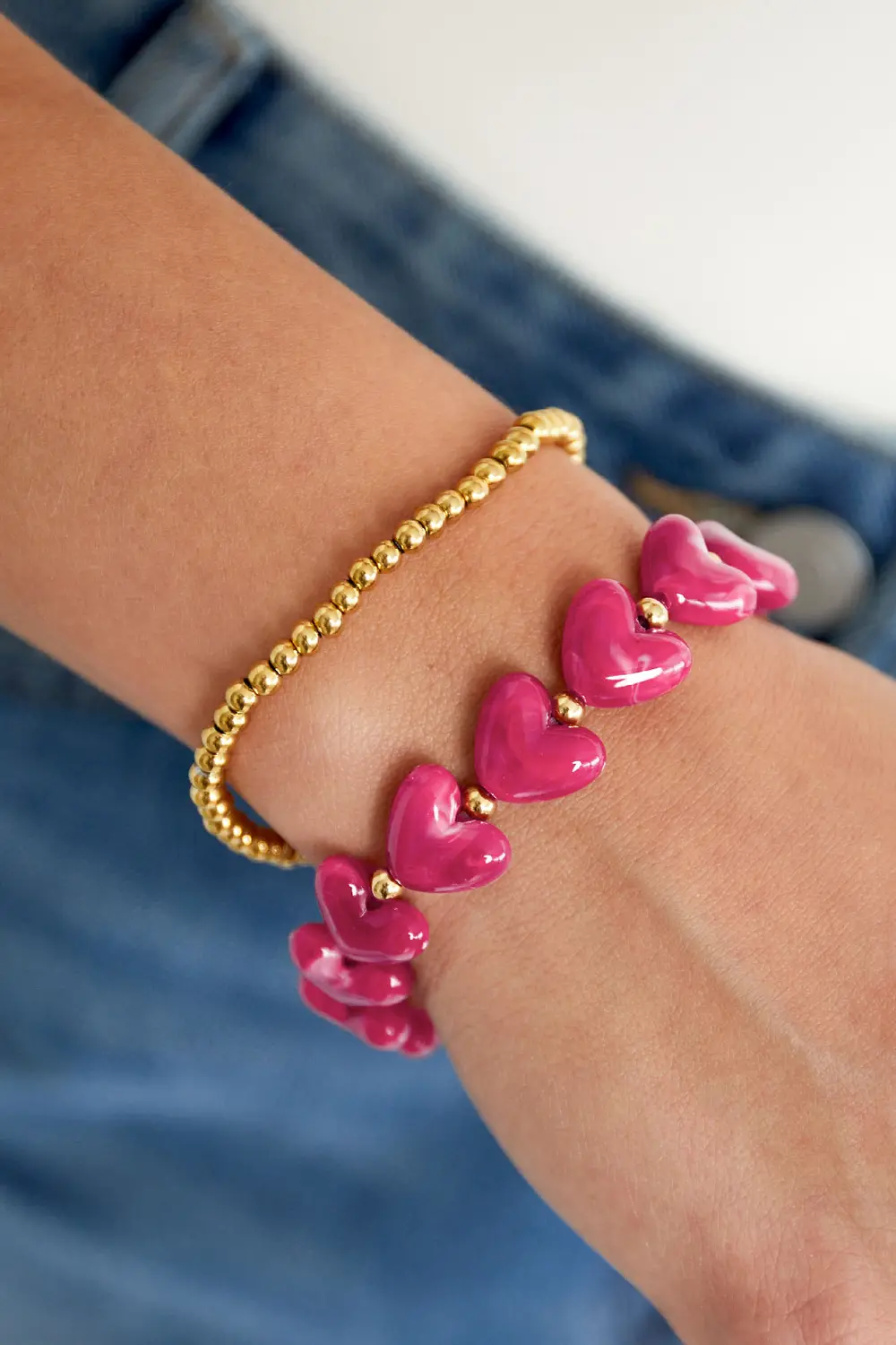 Elastieken hartjes kralenarmband in 4 kleuren